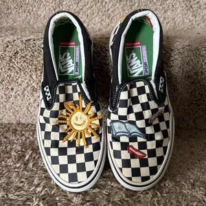 Vans Black and White Checkerboard Slip-Ons with Sun Embroidery